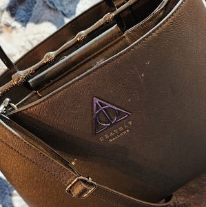 Loungefly deathly hollows satchel
